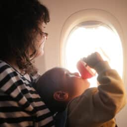 Baby flies on airplane
