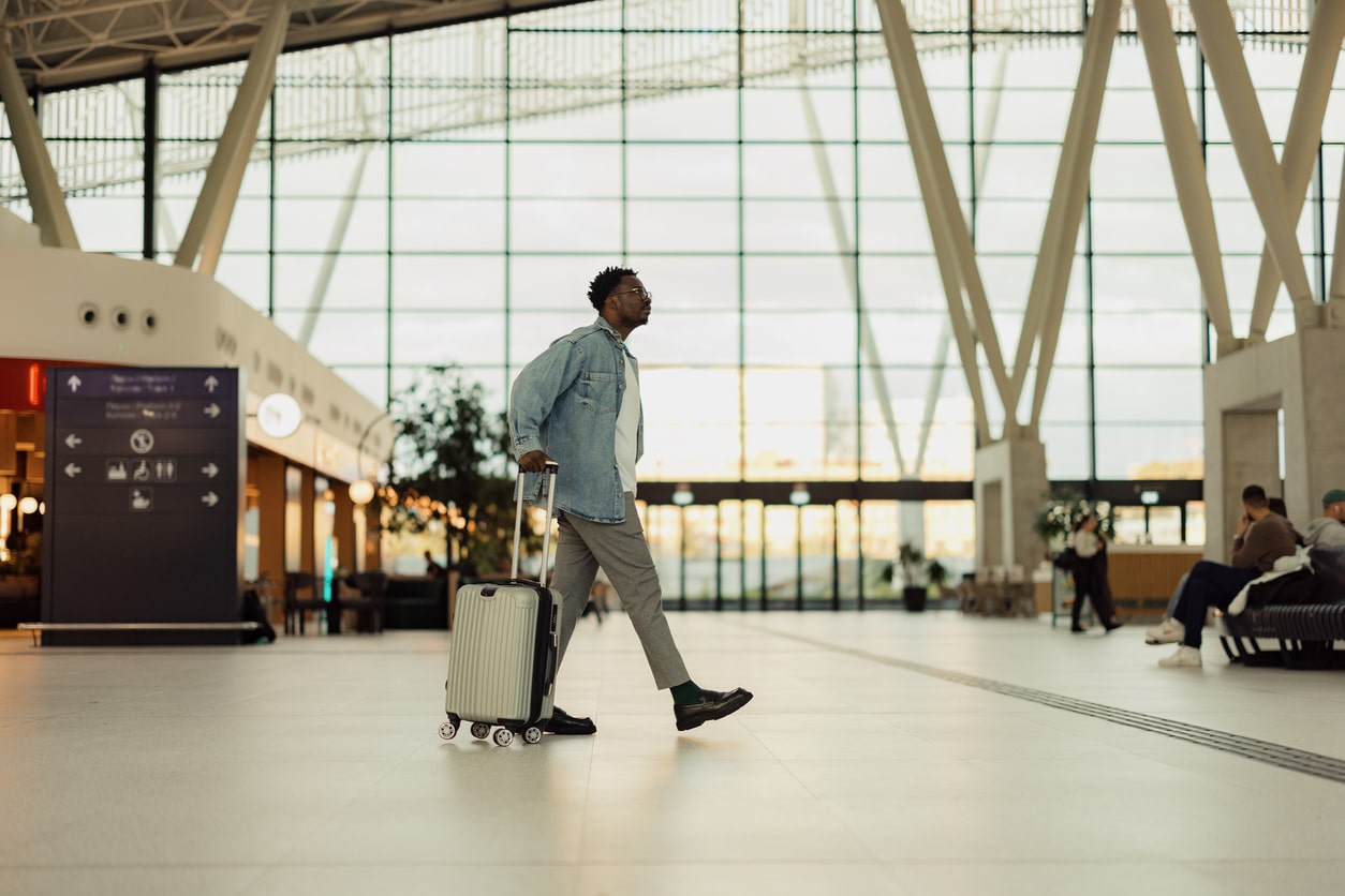 Man with a suitcase in an airport