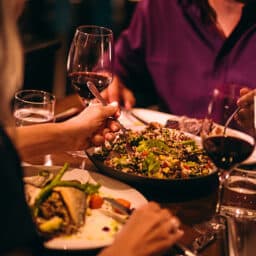 A couple sharing a meal at a restaurant.
