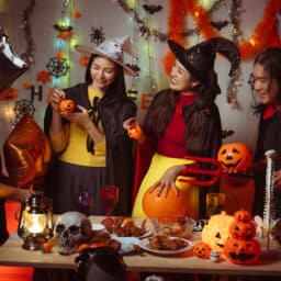 Friends celebrating halloween in costume.